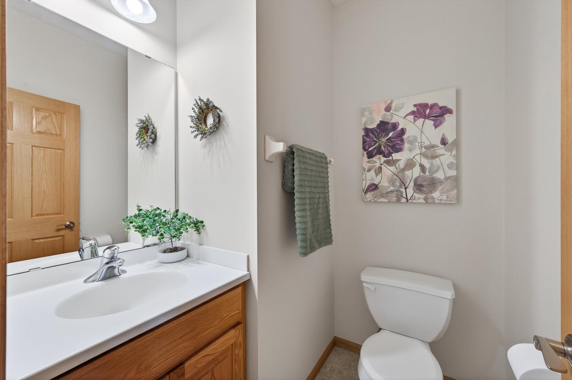 Main floor 1/2 bath, convenient, fresh and bright.