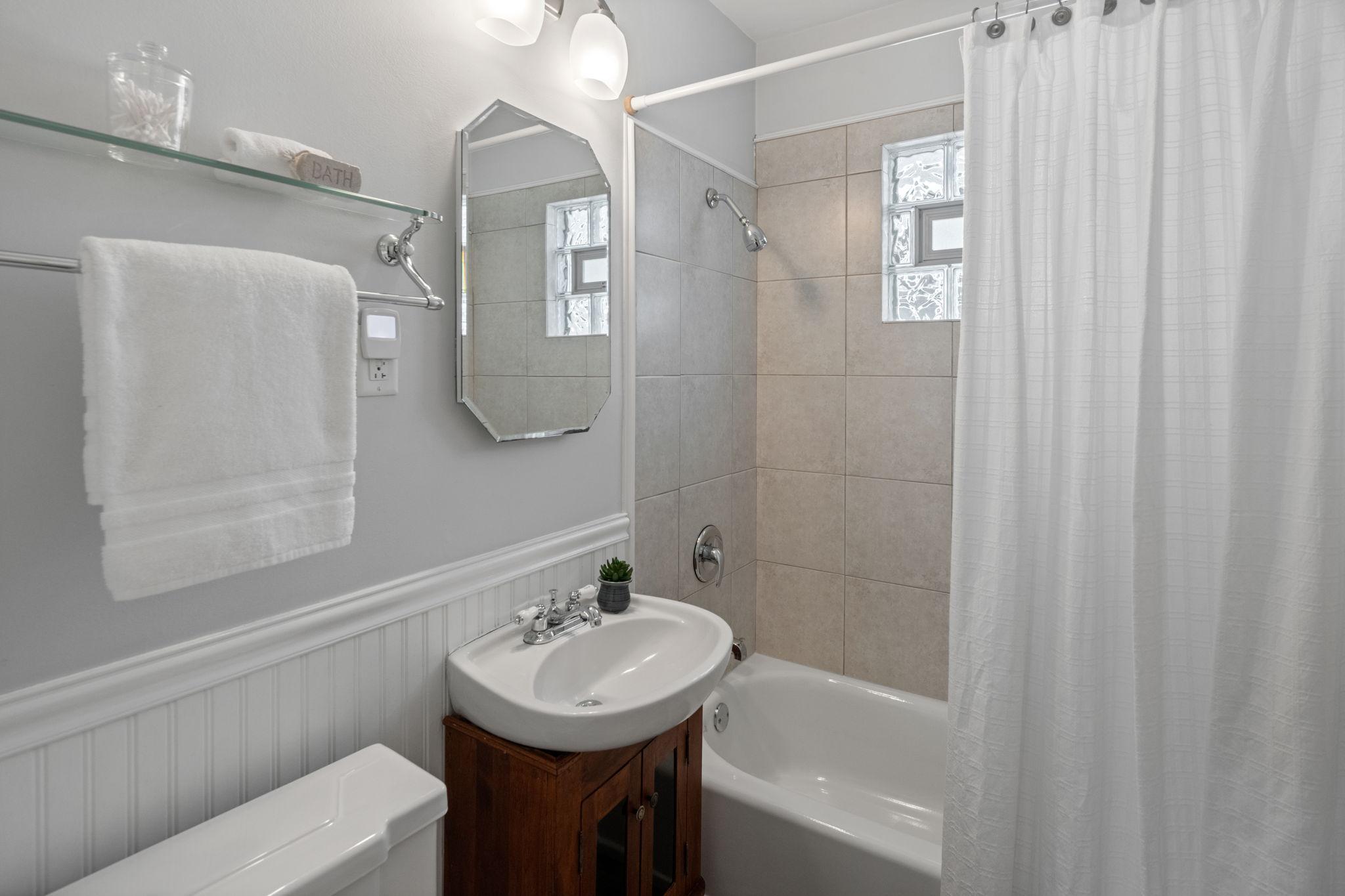 Main level full bathroom.