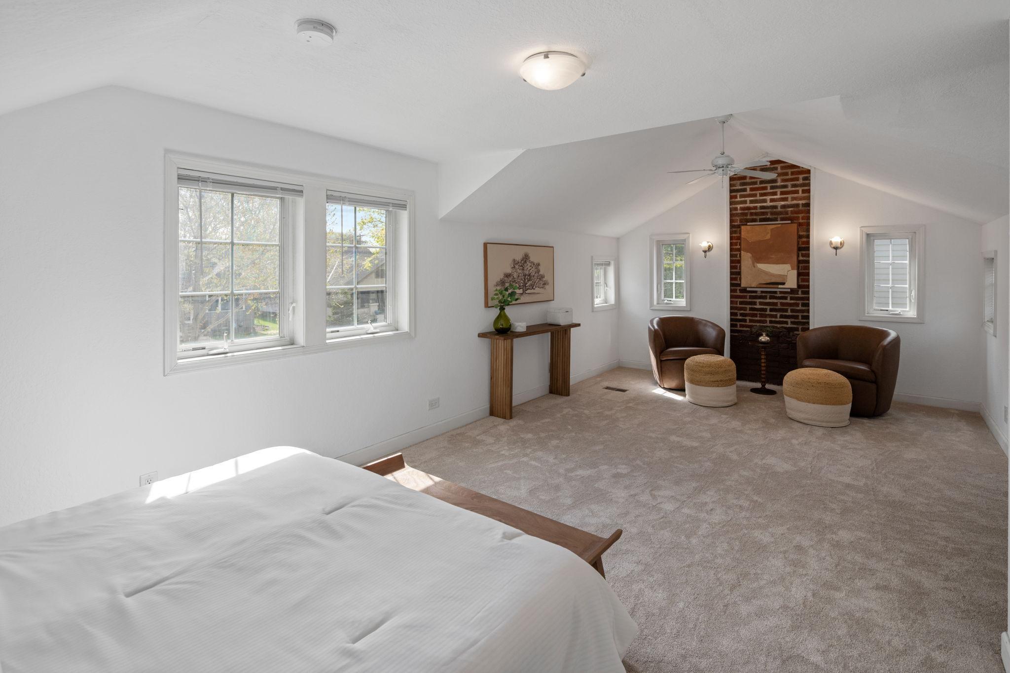 Wonderful light in primary suite. Room for seating area or reading nook or work from home office.
