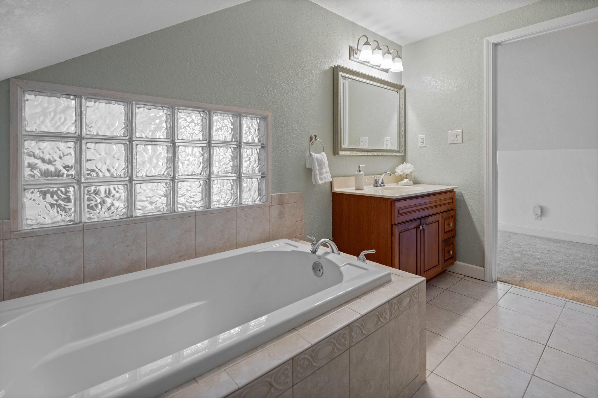 Relax and soak in the primary tub.