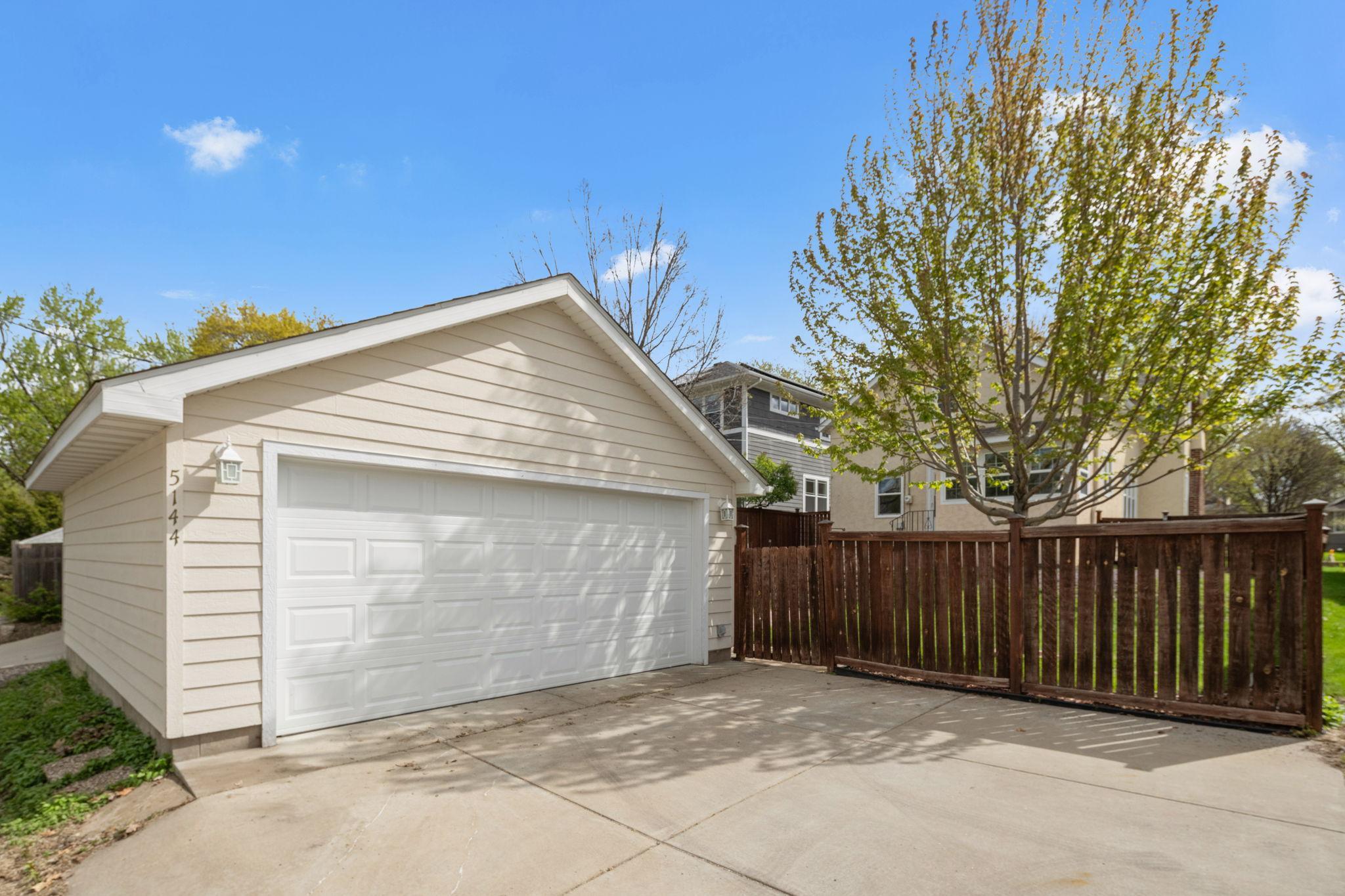 Newer 2-car garage. Separate 100 amp electric panel with EV charger outlet.