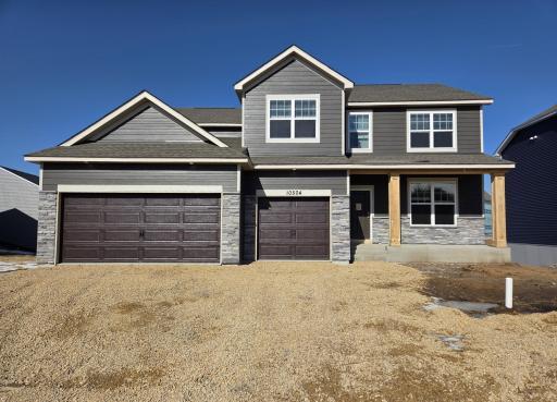 Move right in. Driveway, trees and sod included!