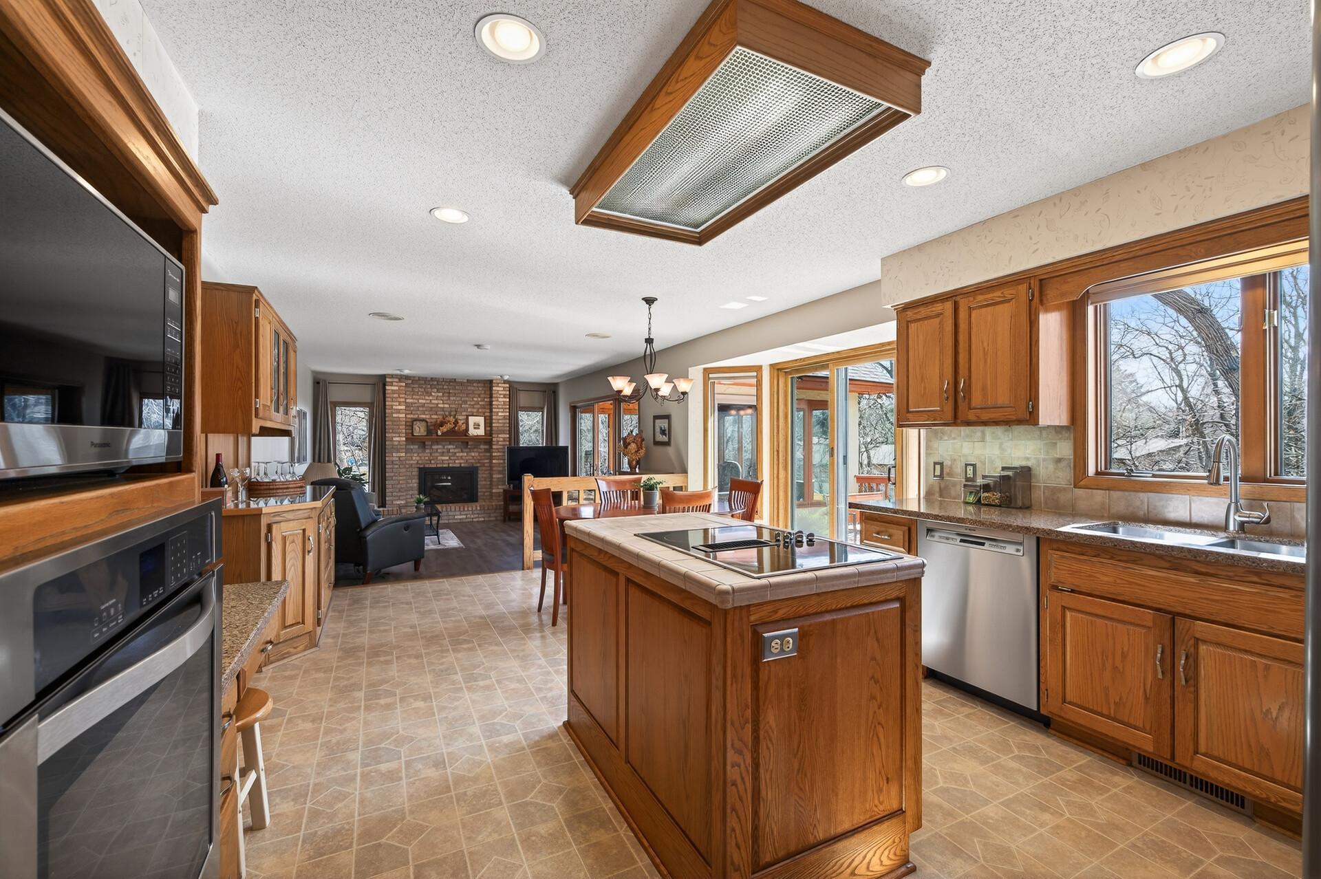 Open-concept kitchen flowing effortlessly into everyday living spaces