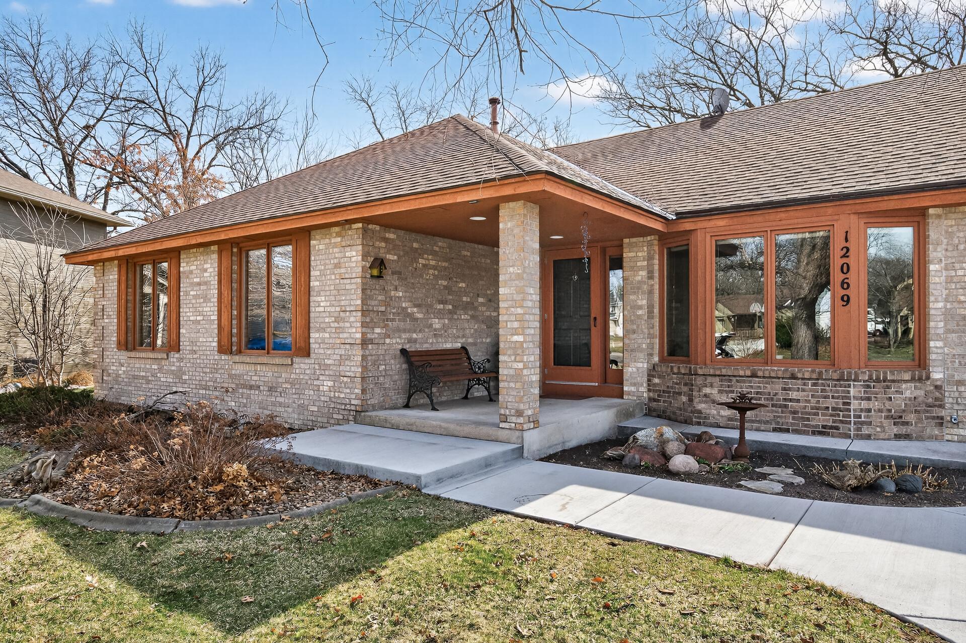 Classic curb appeal with mature trees and a peaceful, established setting