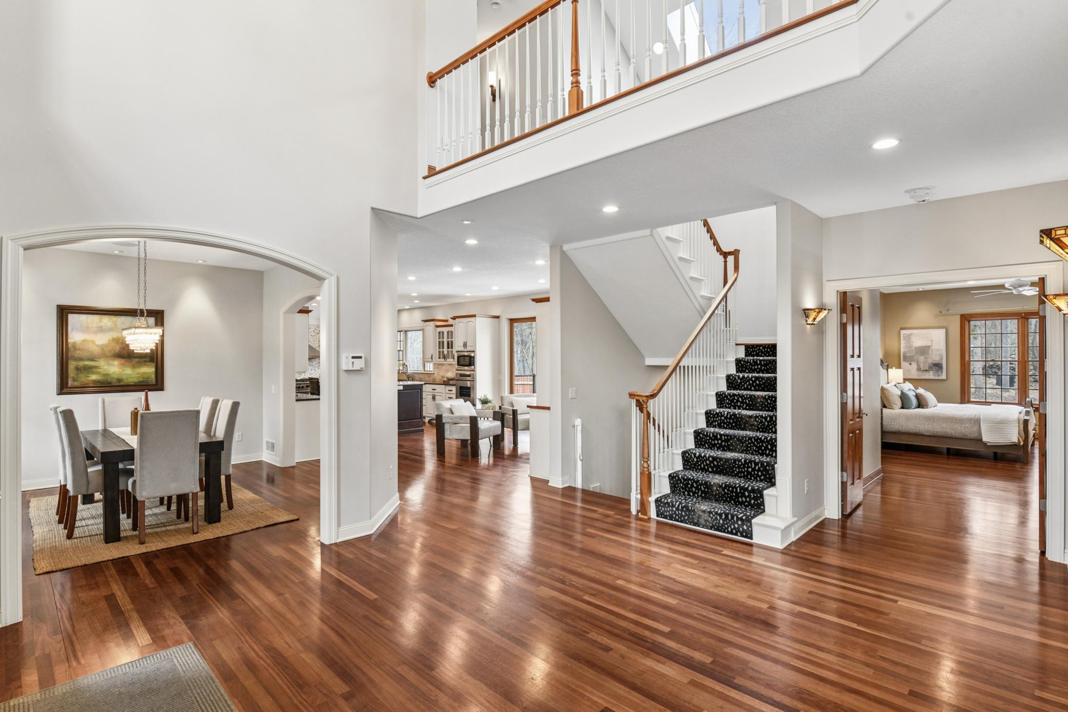 Gleaming hardwood floors greet you at the entry with a lovely open main level floorplan