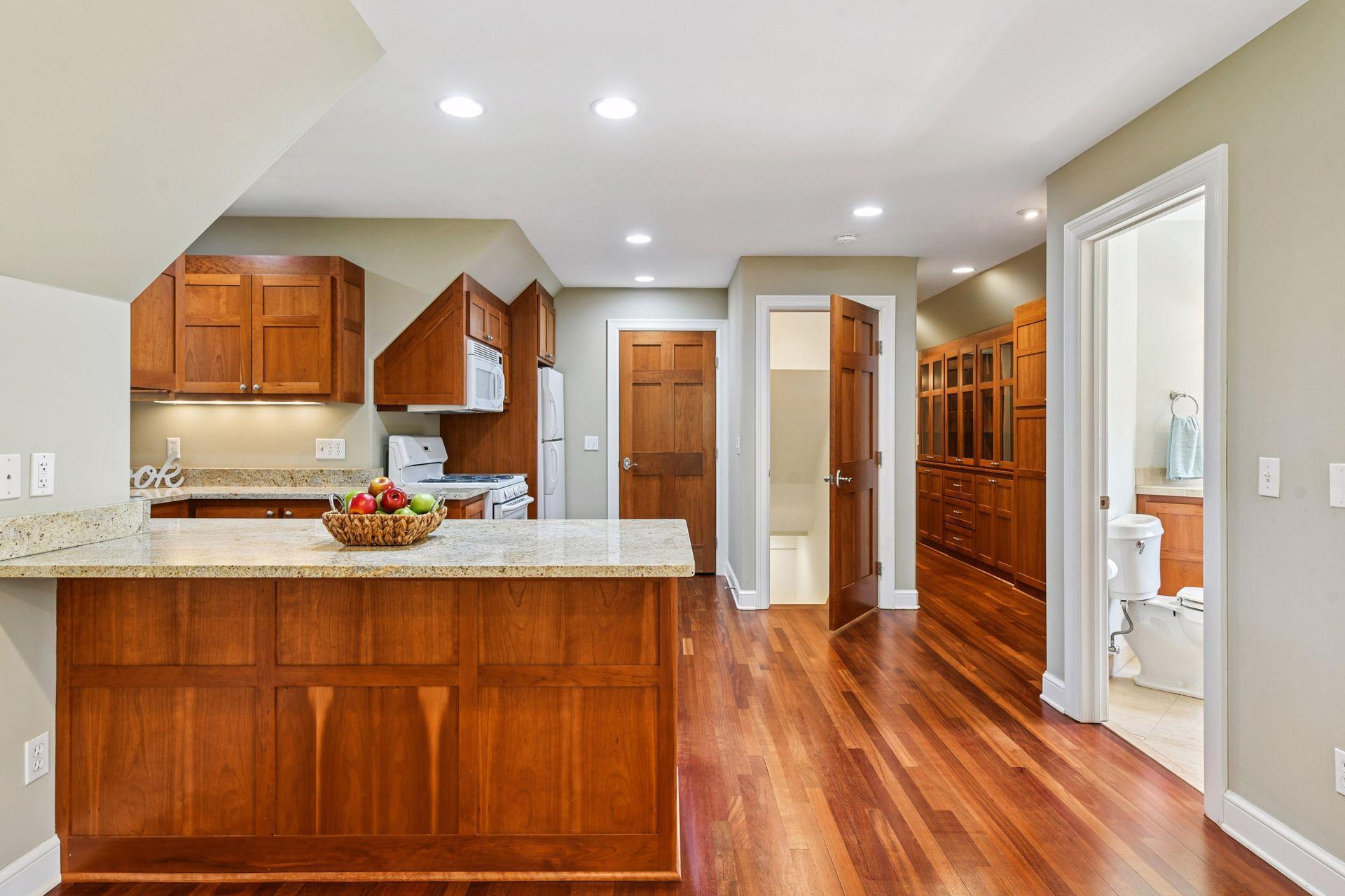 Excellent storage and private stairwells to both the upper and lower garages make this space even more exceptional