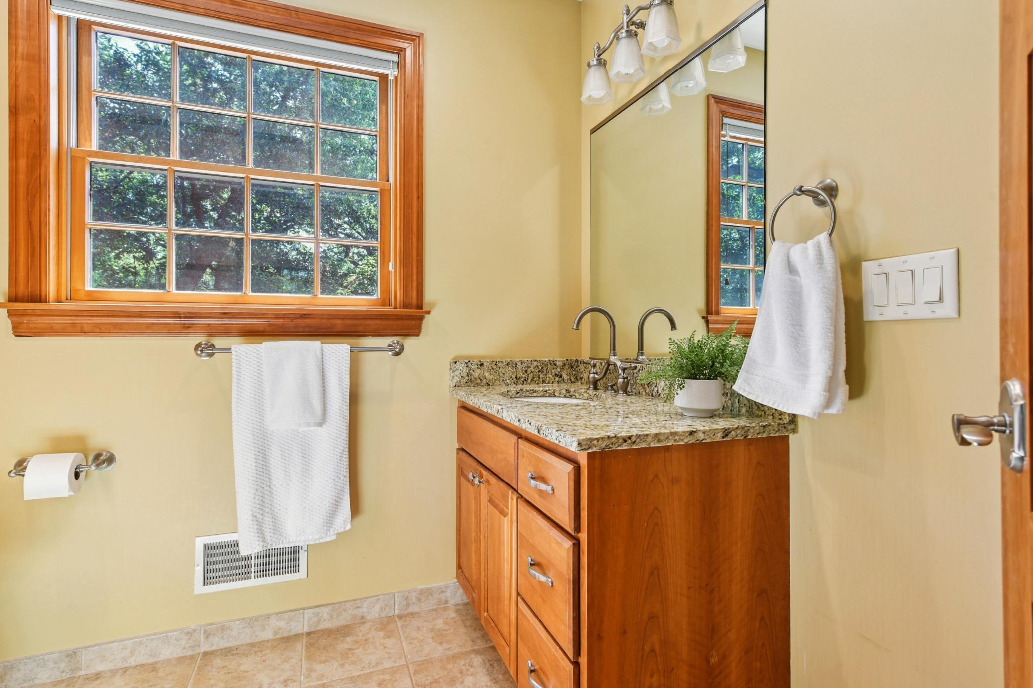 The bedroom is complete with a three-fourth bath featuring a well appointed walk-in shower