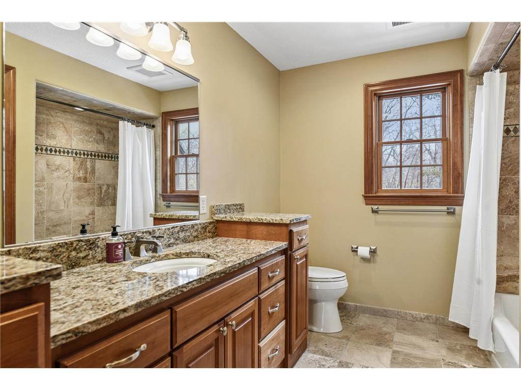 Second floor guest bath with laundry