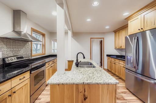 On the other side you have the fridge and another set of upper & lower cabinets. No upgrades needed here