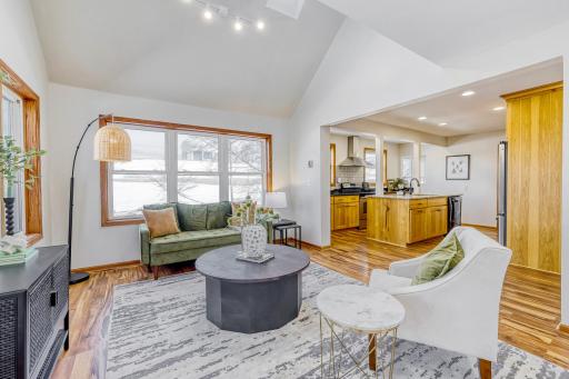 Right off the kitchen so the cook can be a part of gthe party. You do not find open concept much in these older Highland Park homes