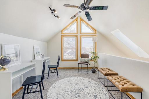 Need to work from home? This loft space with big windows would be a perfect place to get some work done
