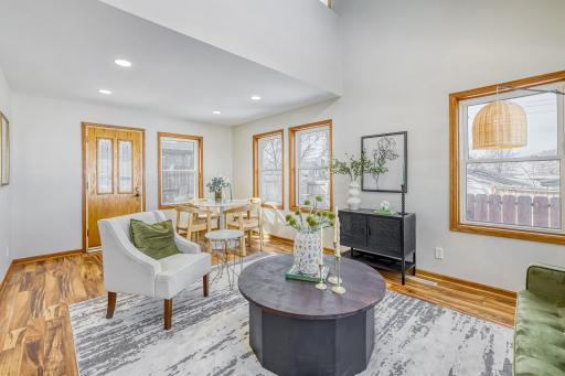 Not only do you have a living room in the front but you have this big family room one the main floor in the back of the house with a door that leads outside to a deck and fenced in yard.02 Living Room.jpg