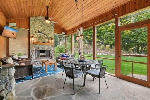 Just off the Hearth Room is the large Screen Porch. This prime outdoor living space features a wood burning fireplace and is wired for audio so you can listed to your favorite tunes while relaxing.