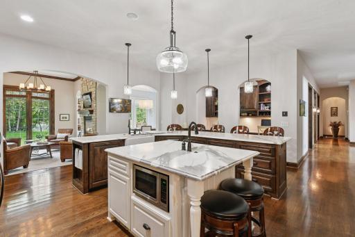 This is truly the heart of the home and is sure to become the space everyone comes together for every holiday, brunch or casual meal.
