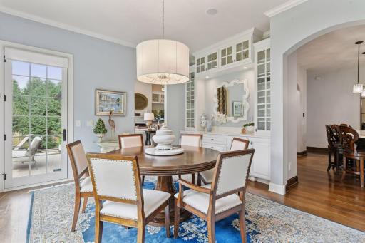 Adjacent to the Kitchen is the bright and airy Dining Room. The built-in buffet provides ample storge for your serving ware and allow you to entertain in style.