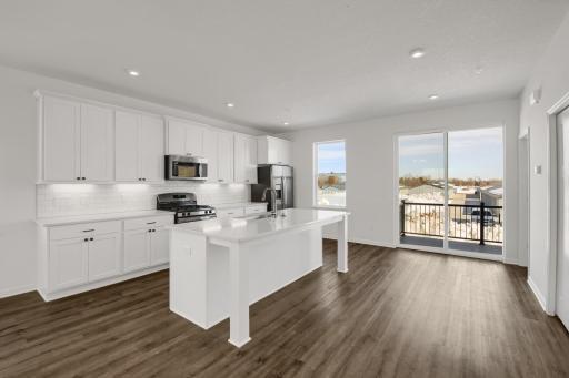 Kitchen *Photo of a previously built home with the same floorplan, finishes/options may vary.
