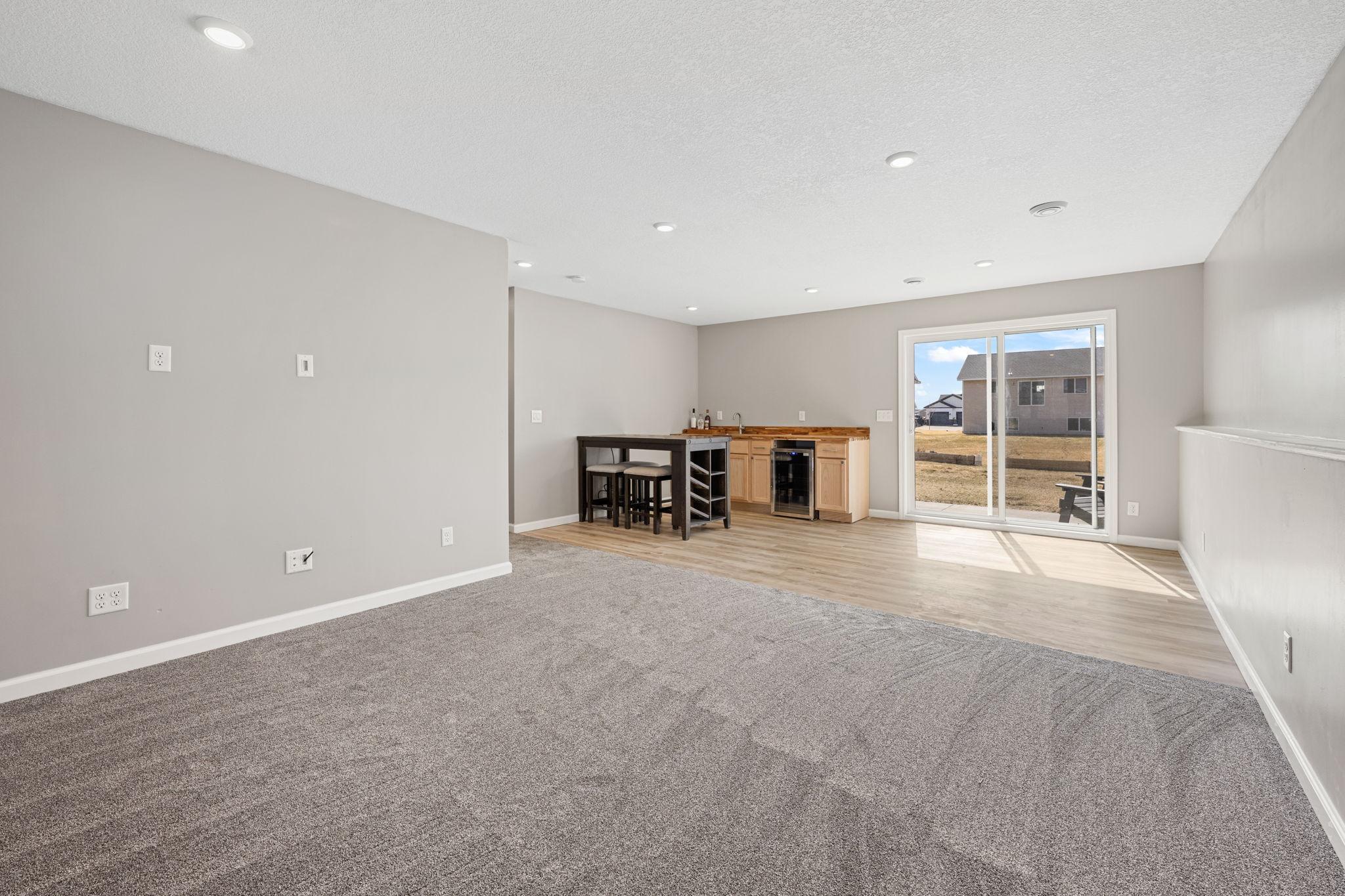 Basement ceiling cavity is filled with R-19 batt insulation and 2x layers of 5/8" drywall for optimal soundproofing between levels of the home.