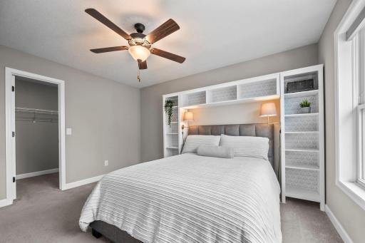 Bedroom 4 on the upper level has a walk-in closet.