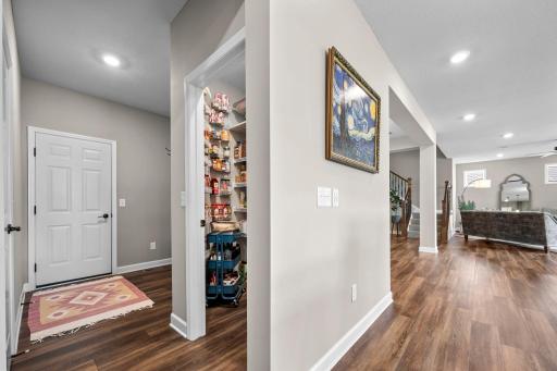 A walk-in pantry is ideally located between the kitchen and garage.