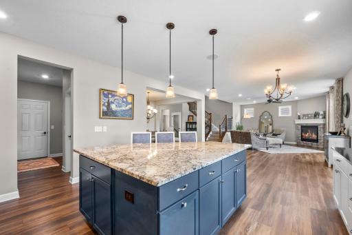 An open concept kitchen allows those working in the kitchen to be included in the festivities.