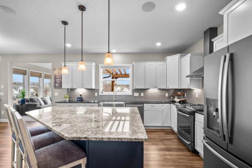 The kitchen is a cook's dream with a gas stove and abundance of counter space!
