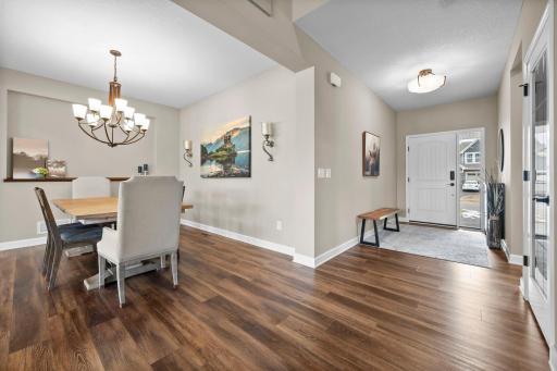 The formal dining room is perfectly situated in the center of the home.