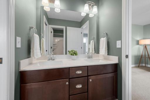 Bedrooms 2 & 3 share this bathroom with a double vanity.