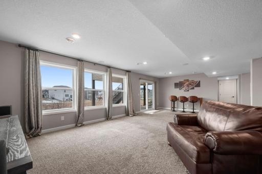 A patio door provides access to the backyard patio and yard.