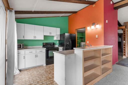 Large kitchen space, vaulted ceiling create a fabulous open floor plan.