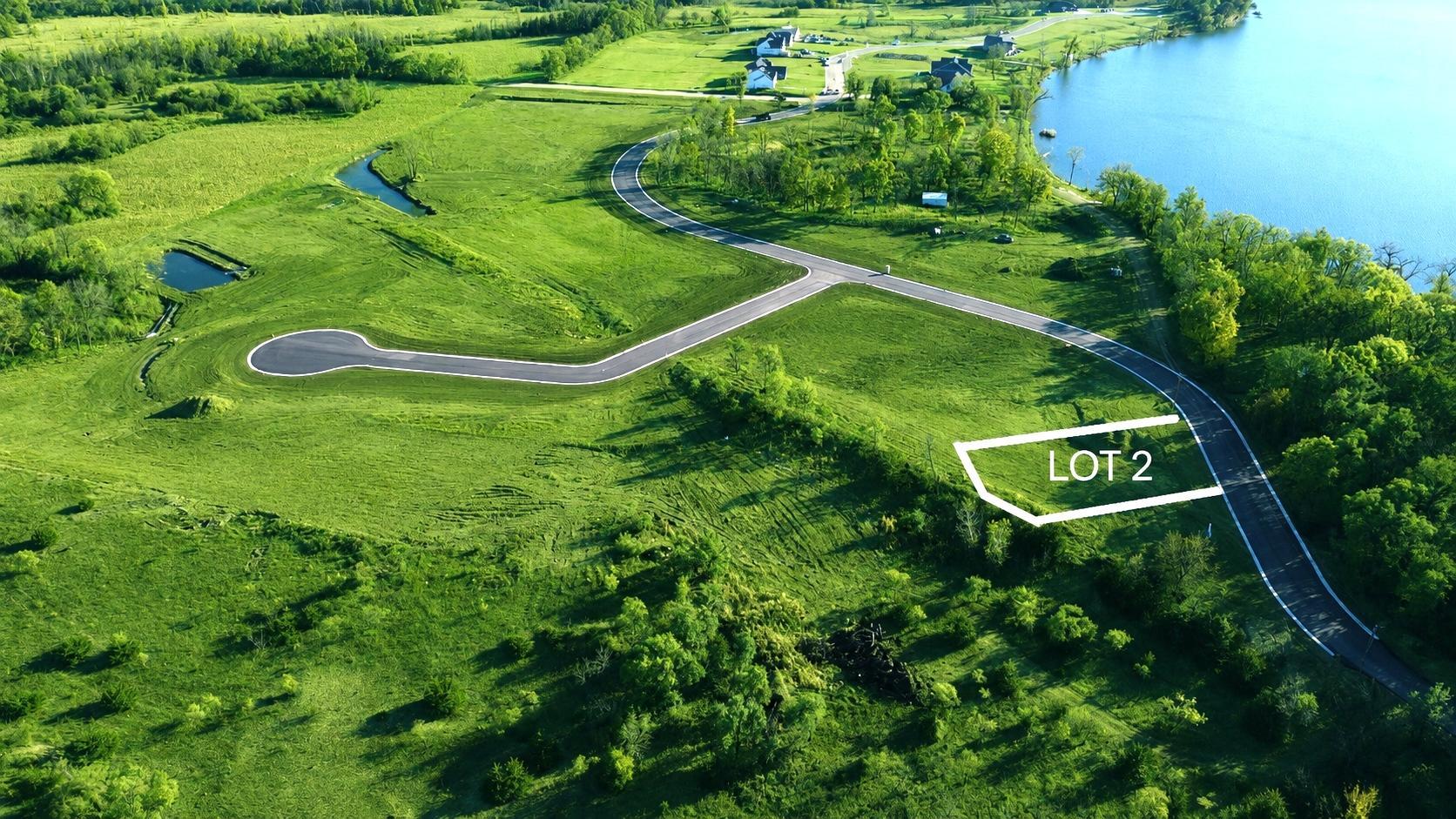 LOT 2 is an oversized .44 acre lot just across from beautiful Lake John.