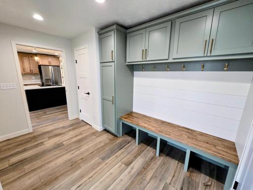 Modern bench with storage cabinets