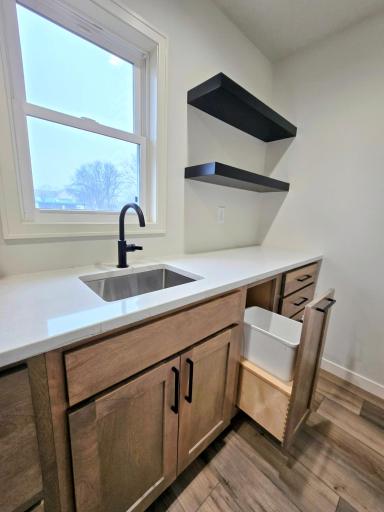 Prep sink, shelving, cabinets- everything was perfectly thought out!