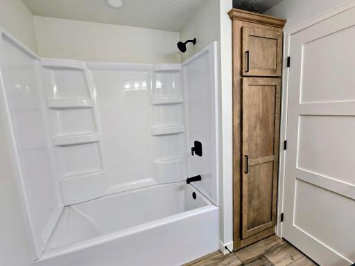 Deep soaker tub with shower