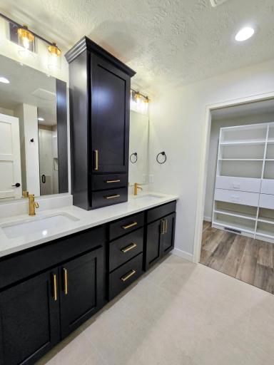 Bathroom is ajoined to the walk in closet