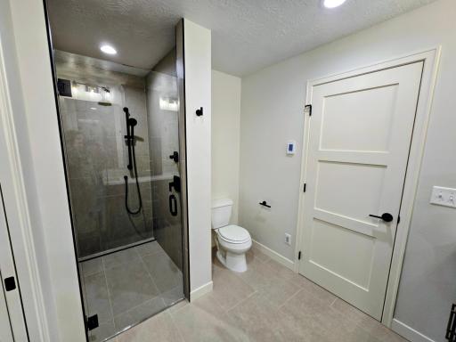 In floor heat and amazing zero entry shower