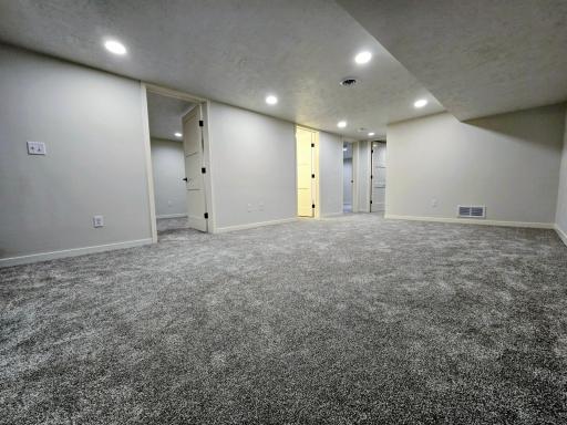 Basement has 2 legal bedrooms with egress windows and 1 non legal (no egress) plus full bath with laundry hookups. This is a great family room for kids!