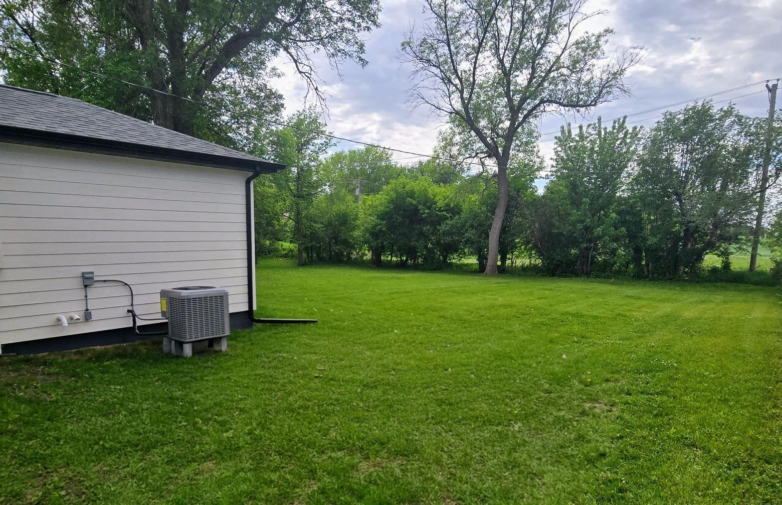 Northside of house-coming out of garage access door