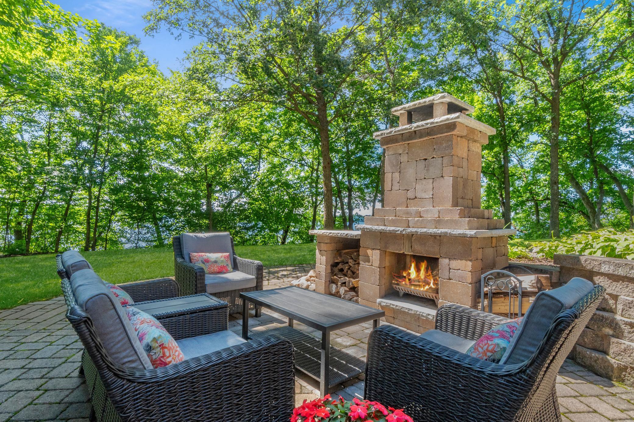 The walk out patio has a new outdoor fireplace - with beautiful lake views