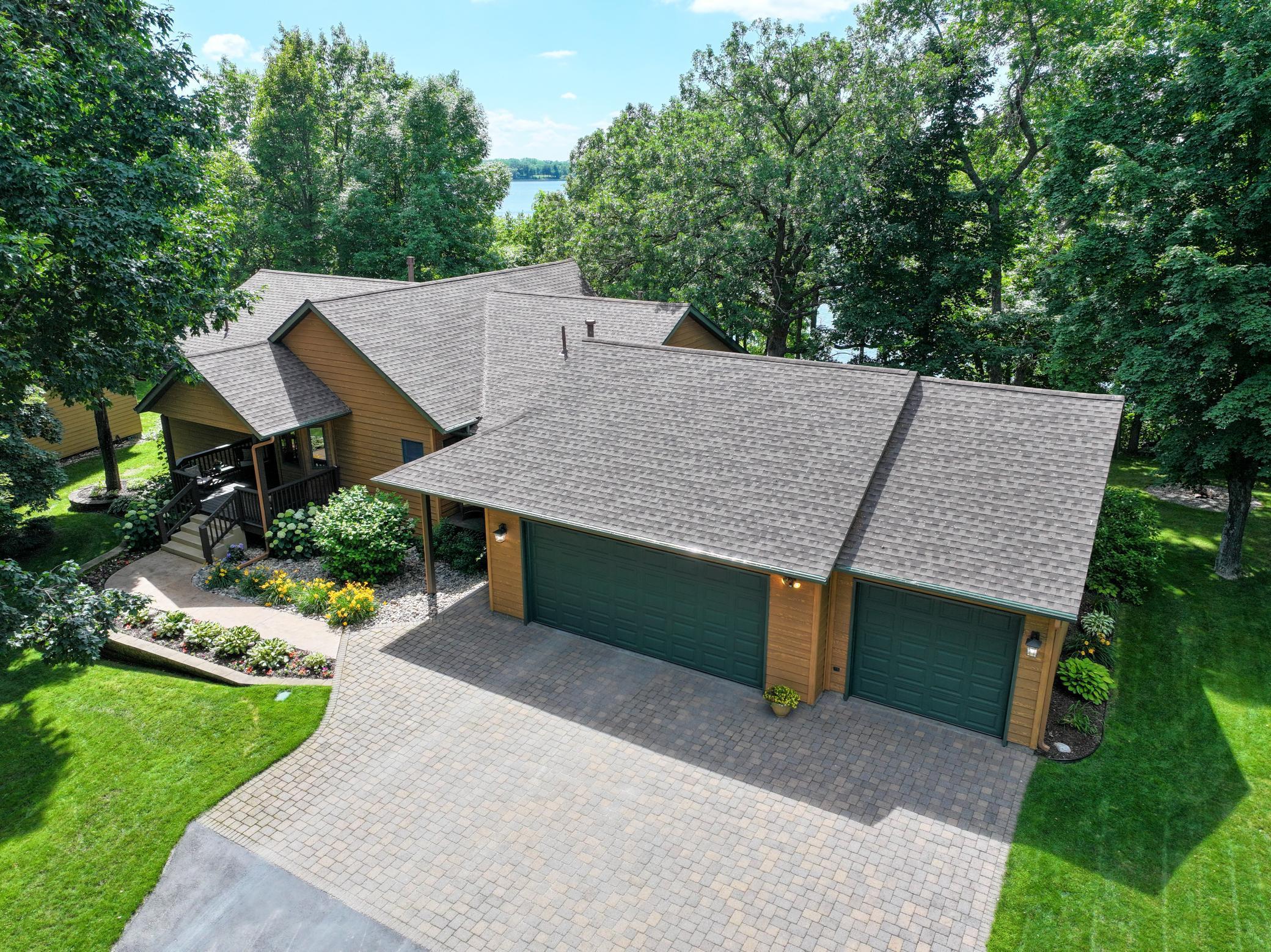 Beautiful landscaping - pavers, multiple decks, many perennials and more!