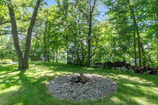 Gather around the bonfire for s'mores and stories. Bonus - the wood pile can stay!