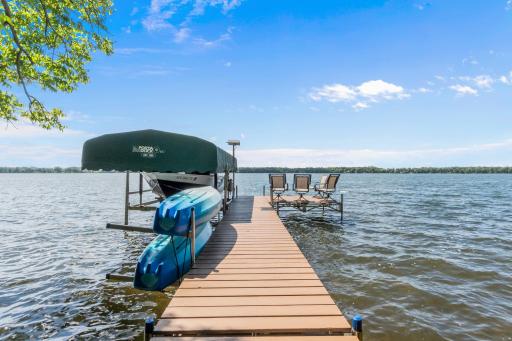 The aluminum dock is included, featuring a large platform for enjoying the lake activity