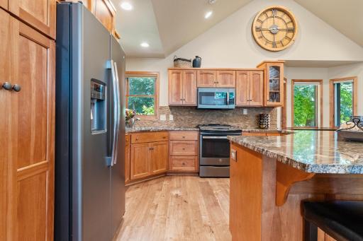 Stainless steel appliances include a gas stove