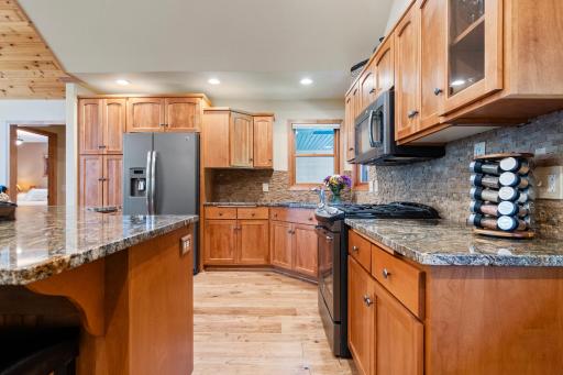 Maple cabinets feature convenient pull-out drawers for easy storage