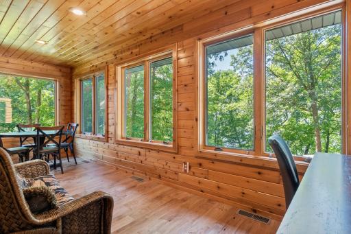 So many options for the sunroom - game room, reading, office and more!