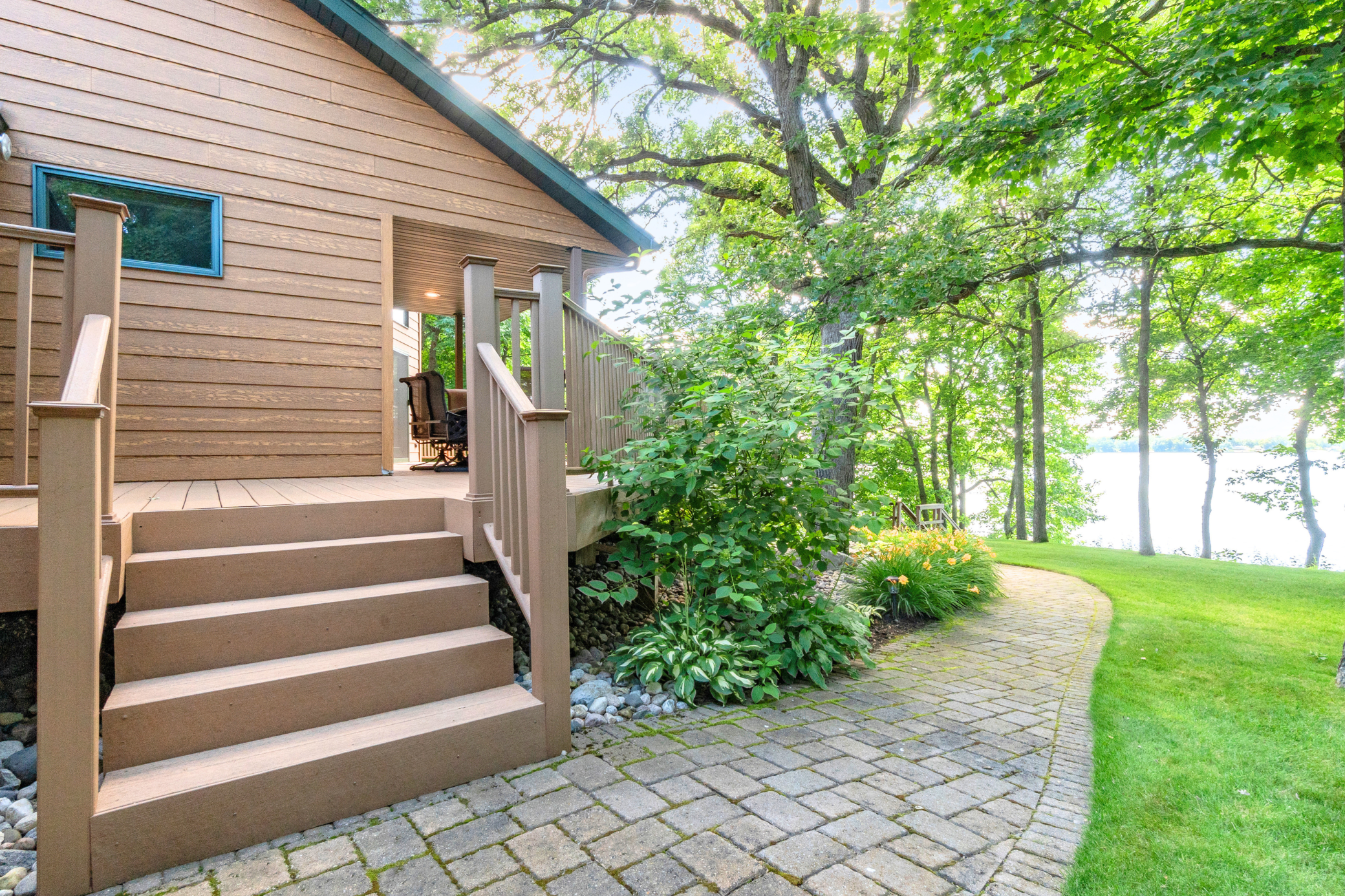 The landscaping is gorgeous with lots of pavers and perennials