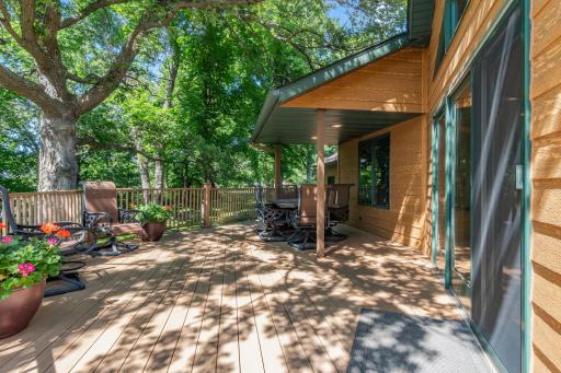 Spacious maintenance free deck with nice shade from trees and the overhang