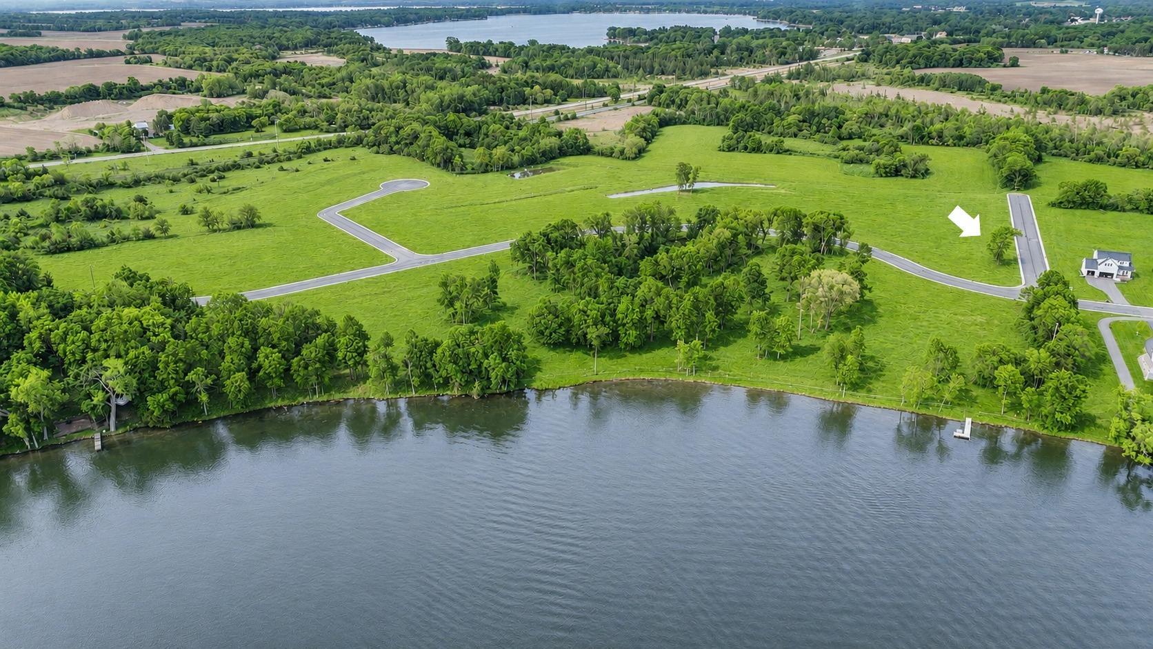This property is nested in the new community of the SHORES OF LAKE JOHN, just west of historic Annandale.