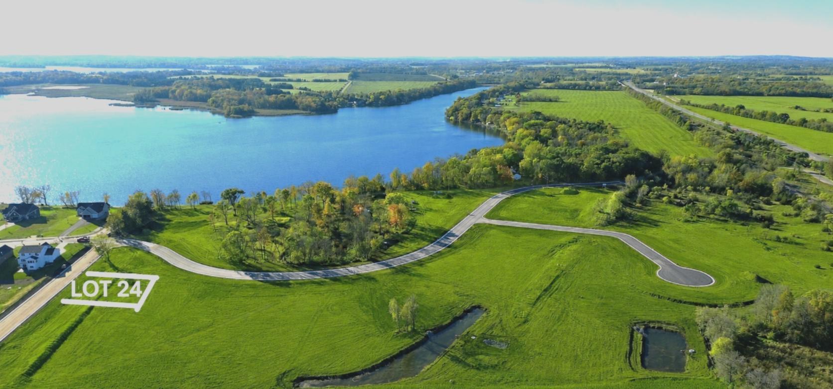 LOT 24 is an oversized .42 acre lot just steps away from Lake John and the lakeside green space.