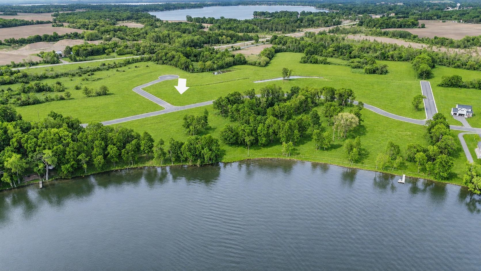 Corner LOT 16 is just steps away from Lake John and all it has to offer. 