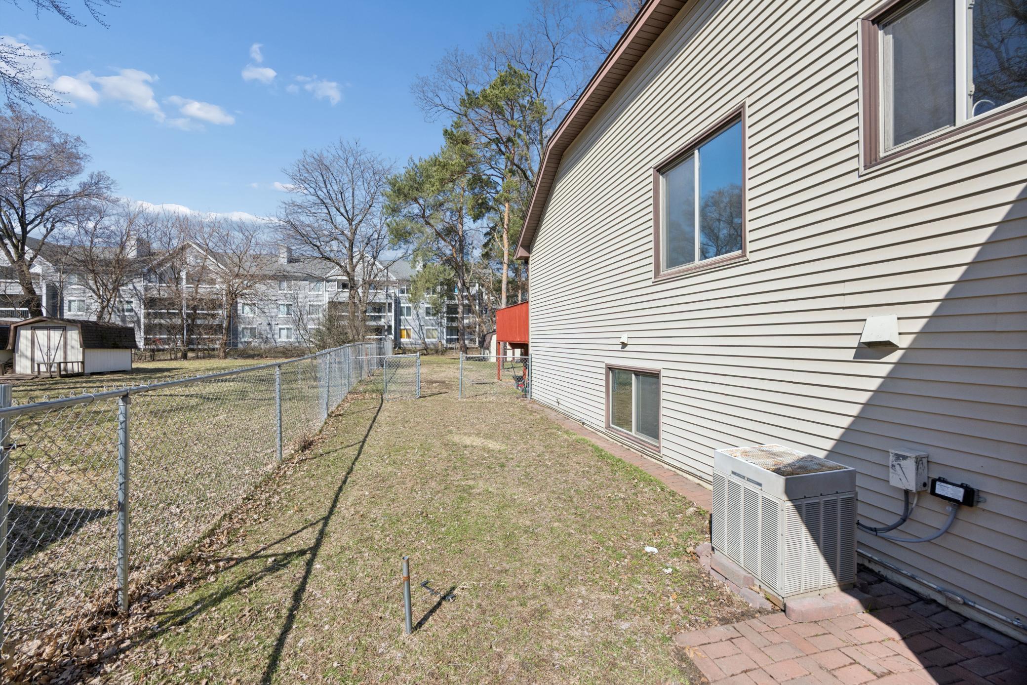 Side view of fenced yard